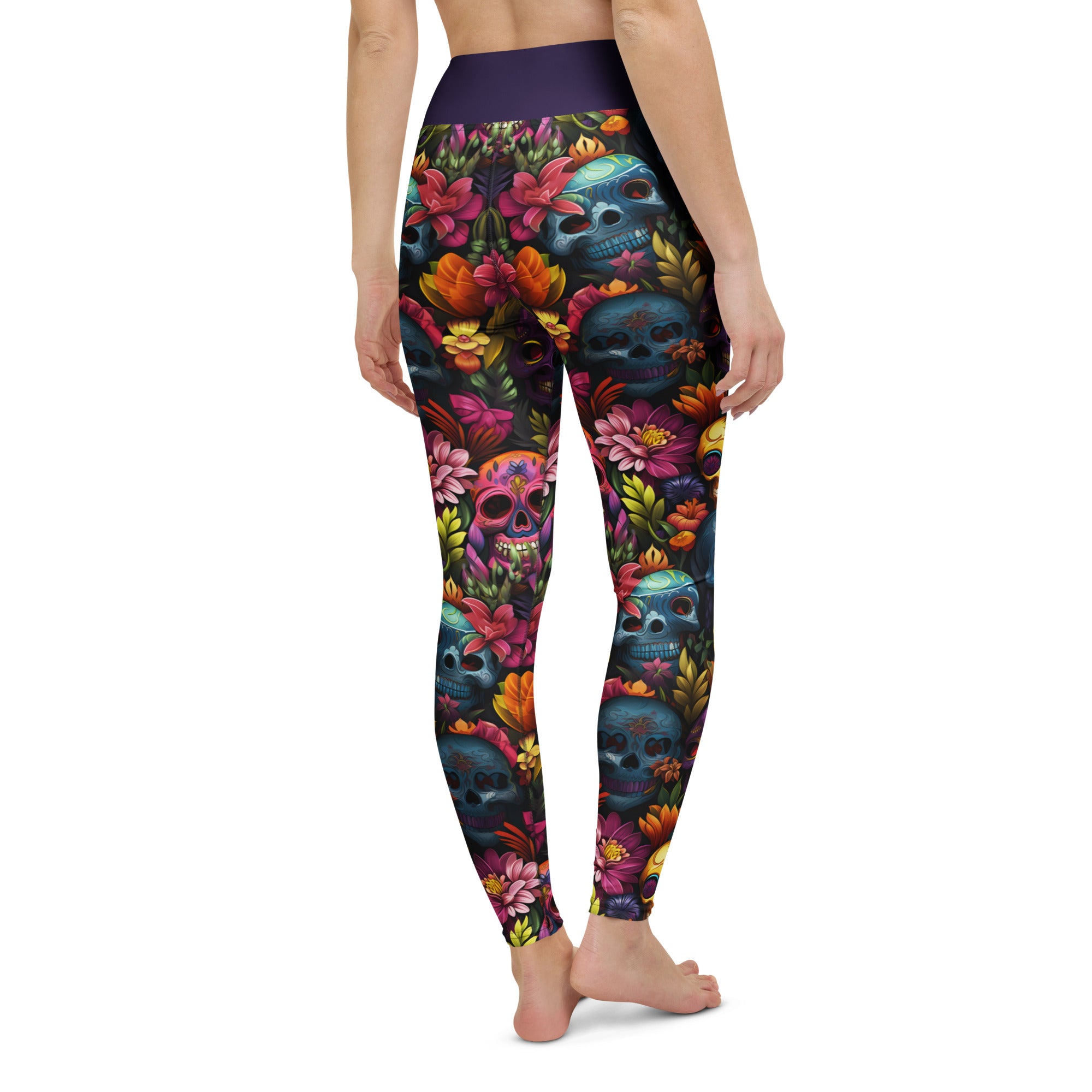 Close view of the wide high-rise waistband on the leggings, above the printed body