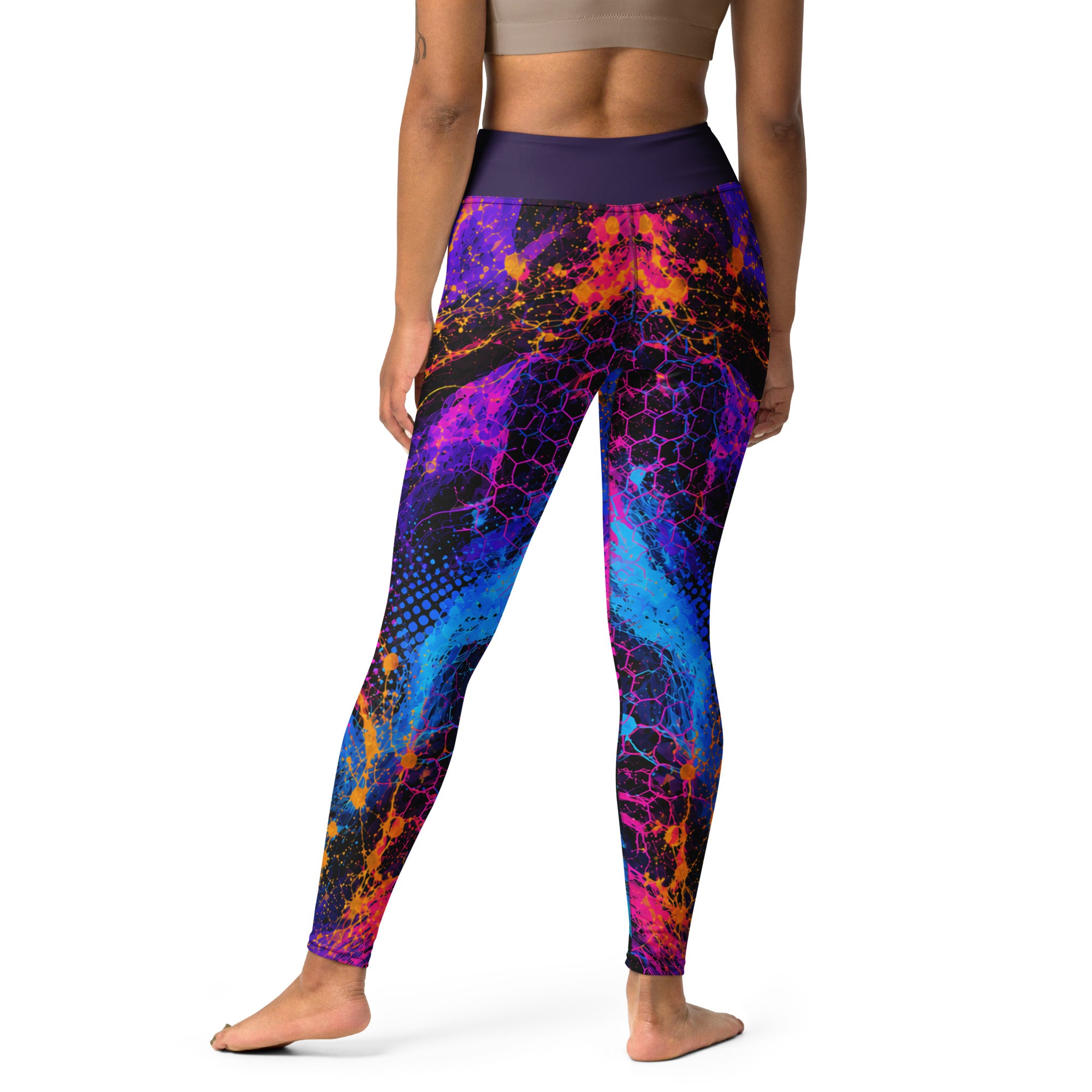 Close view of the centre-back seam on the leggings, the printed pattern continuing across the stitching